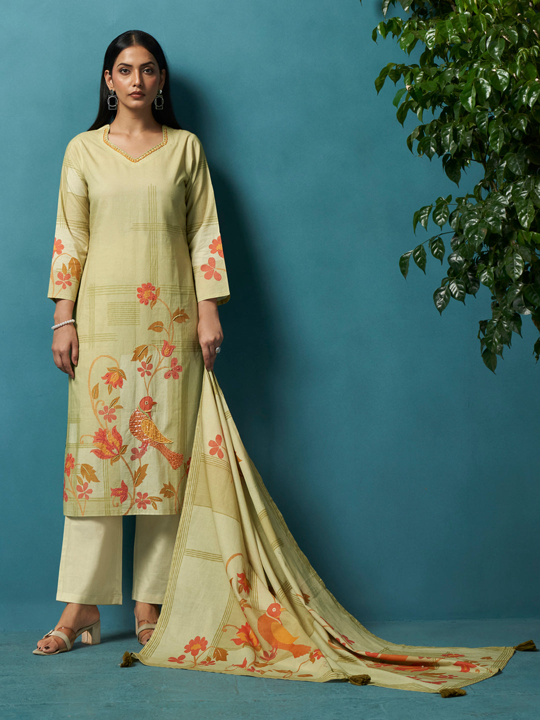 Understated luxury ethnic ensemble blending clean lines with delicate handcrafted embellishments