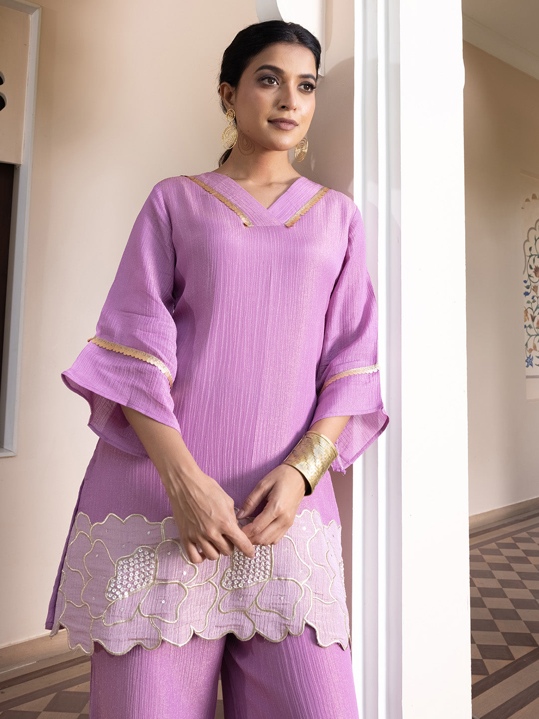 Vibrant luxury ethnic attire tailored for daytime haldi ceremonies, mehendi functions, and brunch festivities