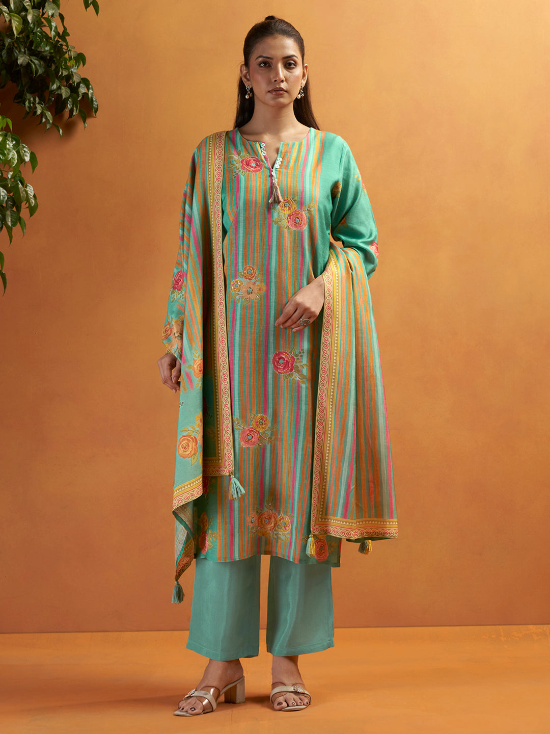 Intricately worked hemline featuring scalloped edges and hand-stitched embroidery patterns